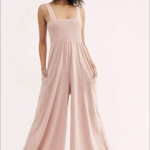 Free people beach pink jumpsuit size XS